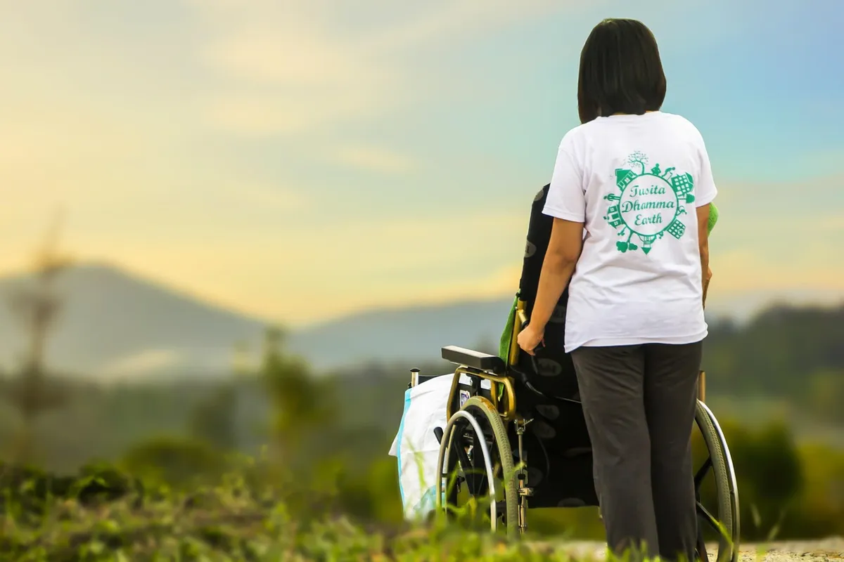 A nurse caring for an elderly patient